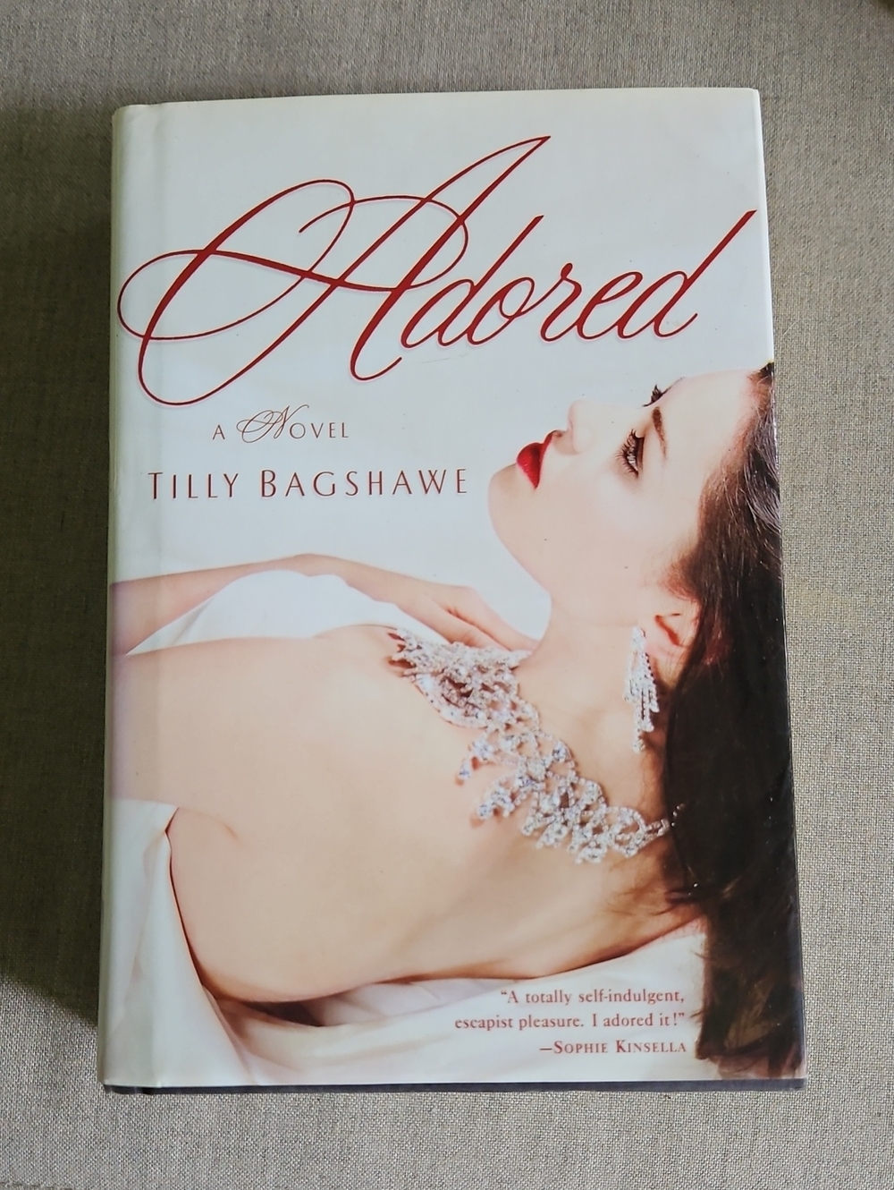 Adored by Tilly Bagshawe - White Cover with Red Text